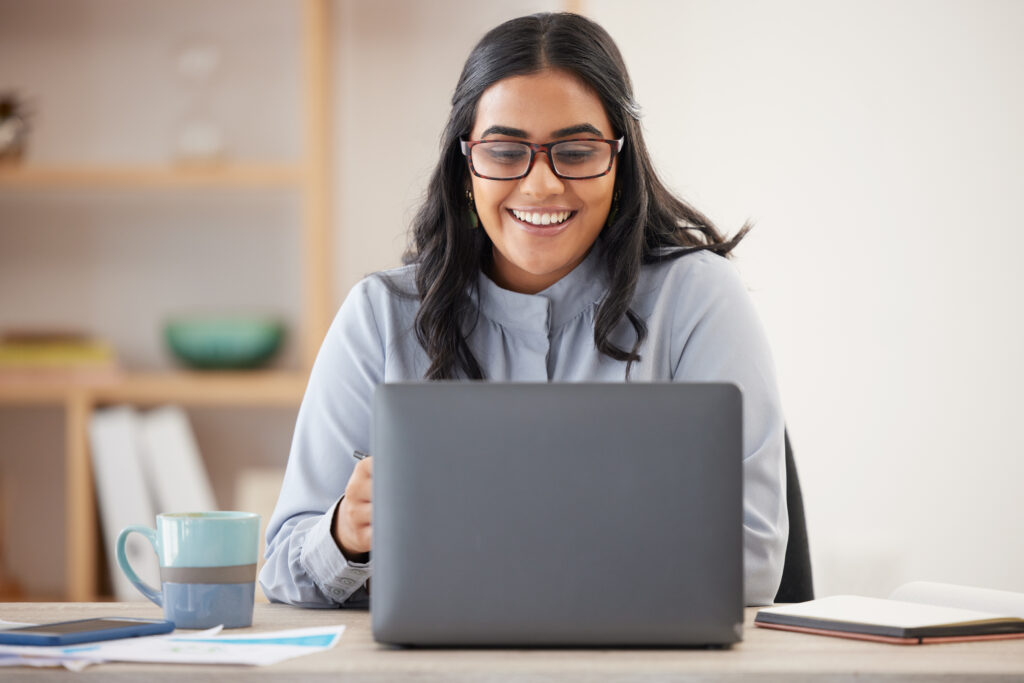 Email, research and business woman with a laptop for a website, internet networking and reading information. Planning, corporate connection and worker with a smile for online feedback on a computer.